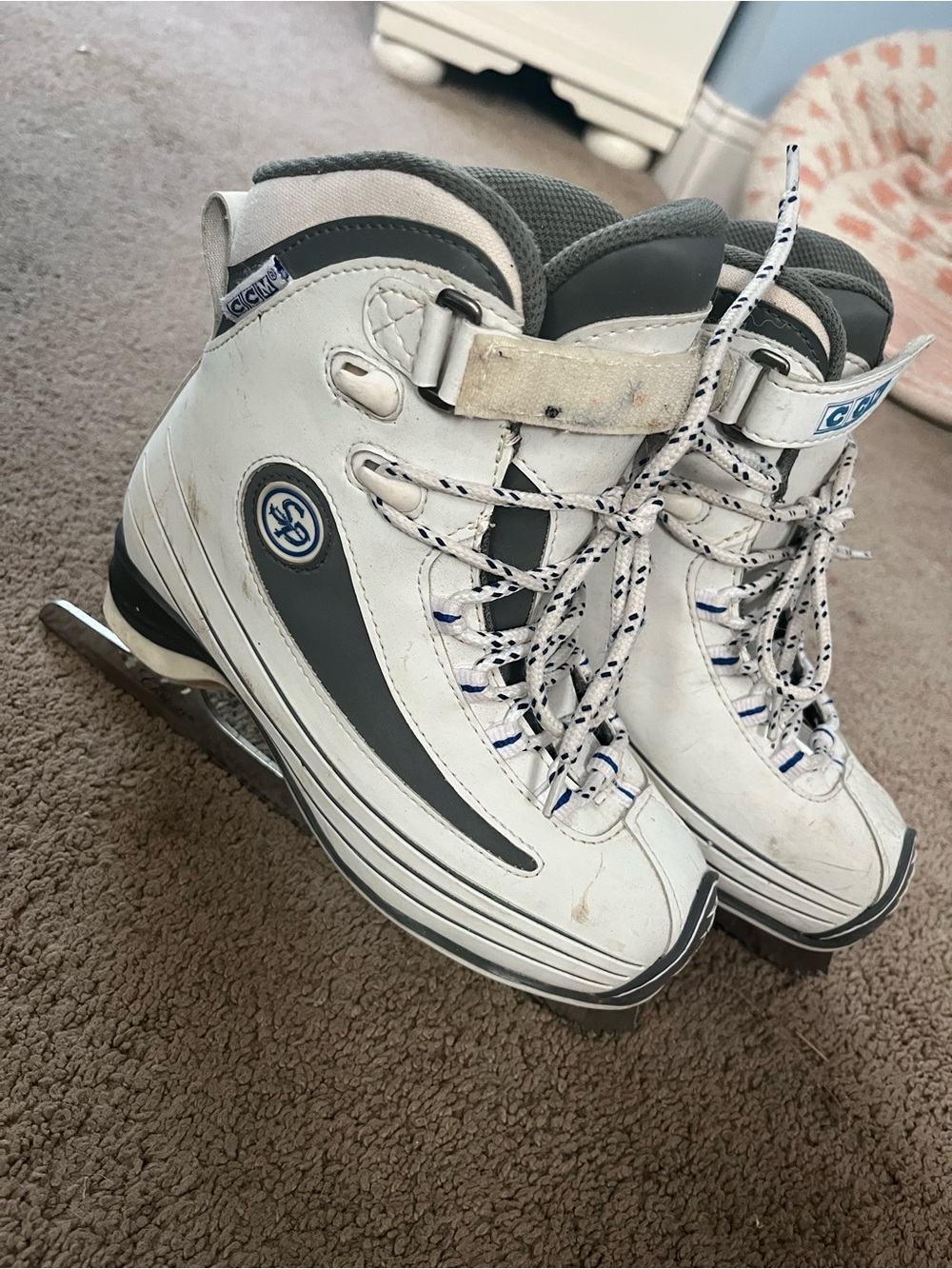 CCM White and Ice Skates with Navy Accents